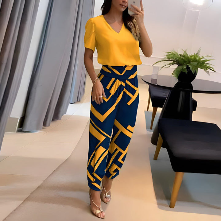 Alexandra - Fashionable outfit with top and pants.
