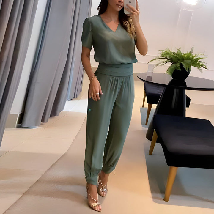 Alexandra - Fashionable outfit with top and pants.