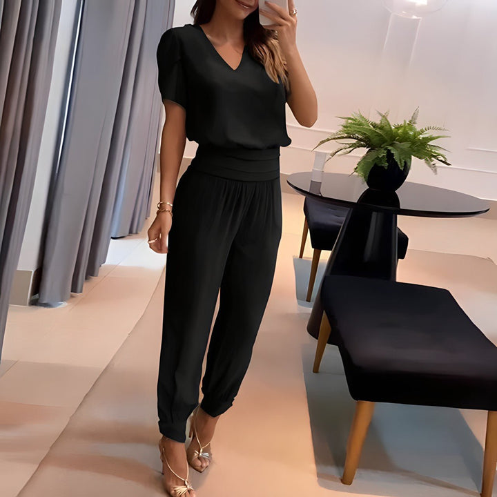 Alexandra - Fashionable outfit with top and pants.