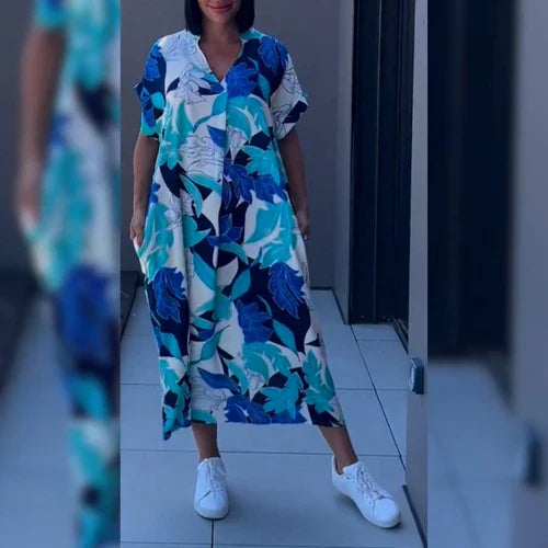 Elena™ – Elegant floral dress for a romantic and refined look.